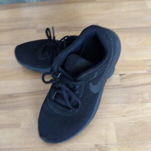 Youth Nike 4.5 all black sneakers.